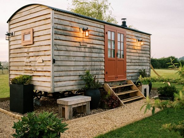 Book Shepherds Hut Spa accommodation at Glampio Gelli Glamping. Best UK  Price Guarantee