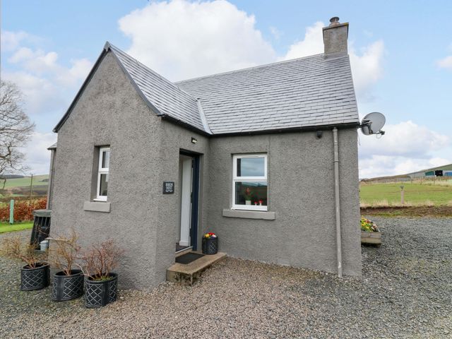 A house exterior with a door and window at Birds Nest in Jedburgh