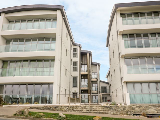 Modern apartment buildings with balconies and large windows at 28 Zenith in Porth