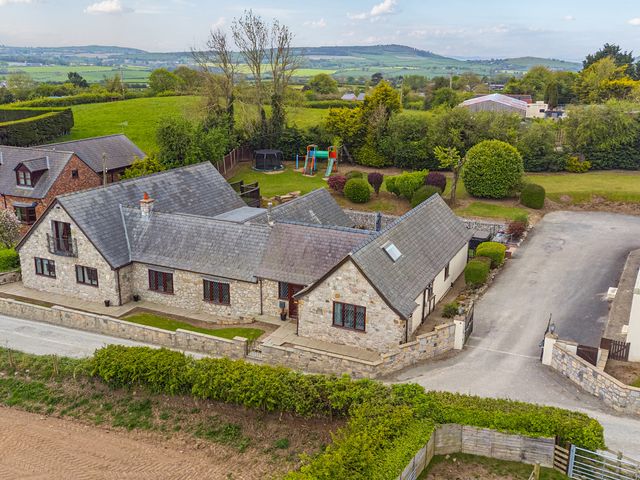 A house with garden and children playground at Arosfa in Axton near Trelawynd