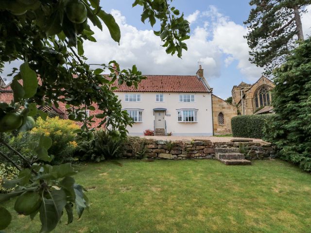 A house with a garden and trees at Weavers Cottage Carlton-in-Cleveland near Stokesley