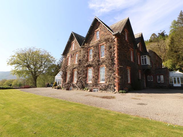A house with a garden and trees at South View in Keswick