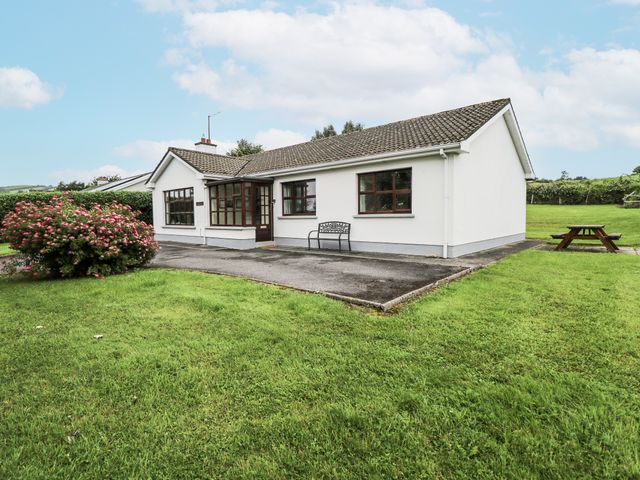 A house with a bench and garden at Brow O' The Hill in Ballyshannon