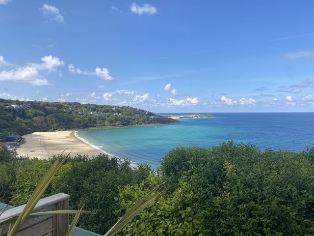 A view of a beach and ocean at Island View in Carbis Bay