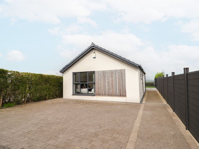A house with a driveway and fence at View@Langho, Langho, Lancashire
