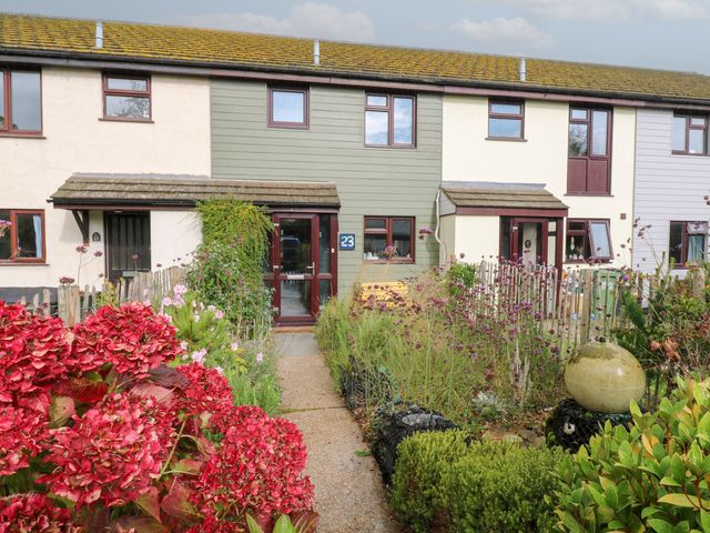 A house with a garden and number 23 at Coastguard Cottage in Rye