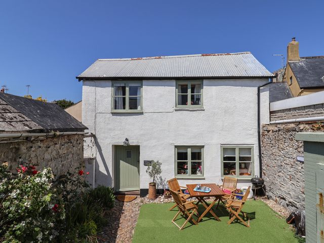 A house with patio furniture at Cleve Cottage in Lyme Regis