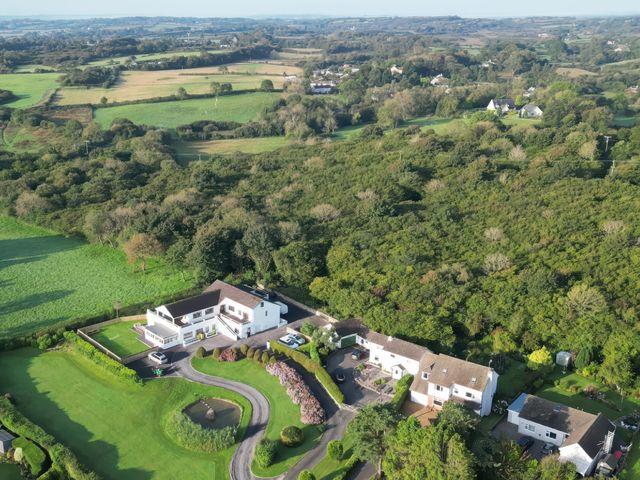 An aerial view of houses and gardens in an outdoor area at Top Of The Lane Luxury Holiday Apartment Benllech