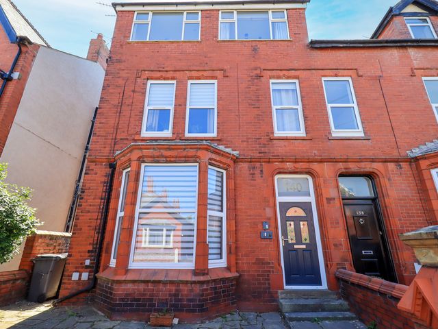 An exterior view of a brick building with windows and doors at The Nest in Lytham St. Annes