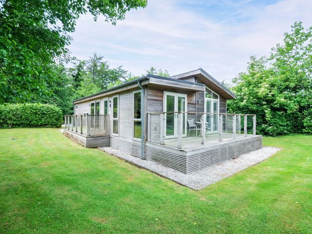 A house with a deck and glass railing in the outdoor area at 5 Faraway Fields Dobwalls