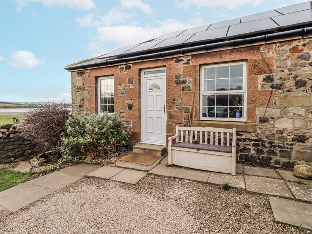 An exterior view of a cottage entrance at Kittiwake Cottage, Budle Bay, Bamburgh