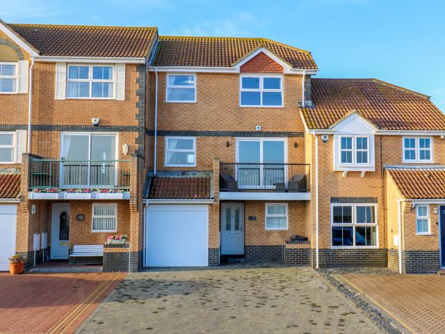 A house with a balcony and garage at 79 Selsey Avenue