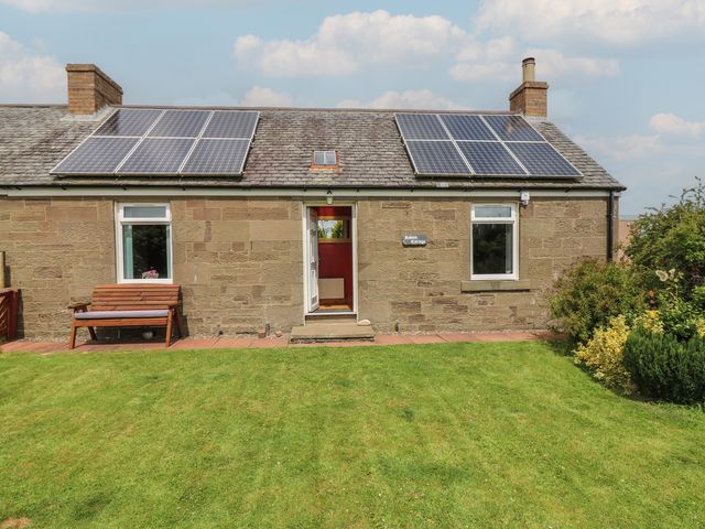 Exterior view of a house with solar panels at Rowan Cottage Redcastle near Arbroath