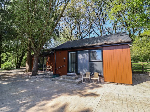 A house with steps and chairs at Jasmine in Bydown near Barnstaple