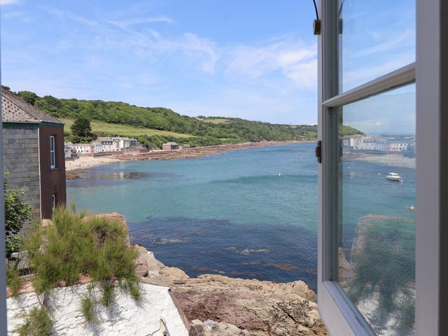 A view of water and boats from a window at Marina