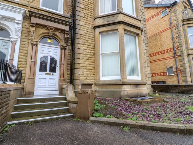 An entrance area with steps and a front door at Paramount Apartments Lytham St. Annes