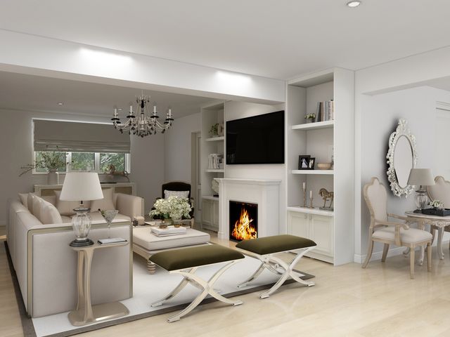 A living room with a fireplace and television at The House at School Farm in Hassall near Haslington