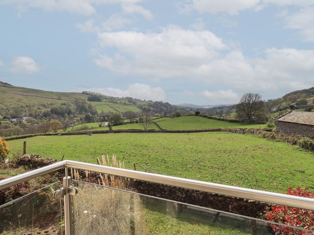 A view of rolling green hills at Haystacks in Troutbeck