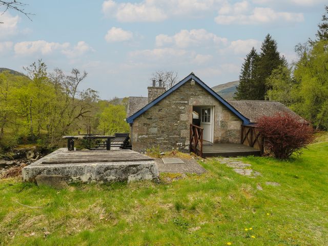 A building with a deck and bench in an outdoor area at Culearn Mill, Balquhidder, Perthshire, Scotland