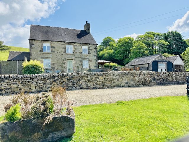 A house with a garden and outbuilding at HollyDale in Bradnop near Leek