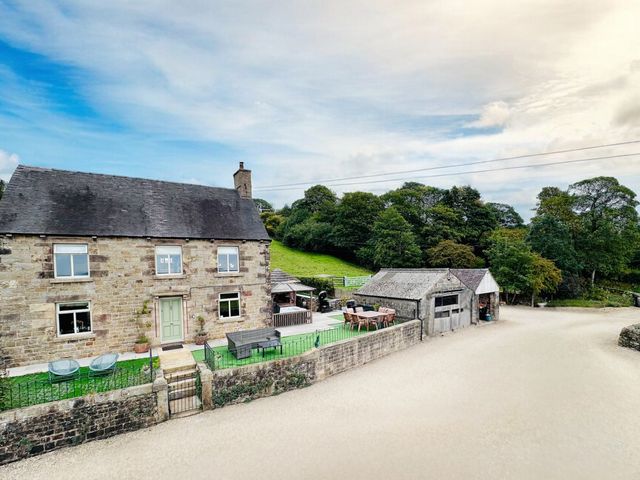 A house with a garden and patio area at HollyDale in Bradnop near Leek