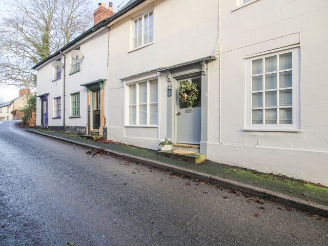 A front view of a house with a door and windows at 8 Welsh Street Bishops Castle