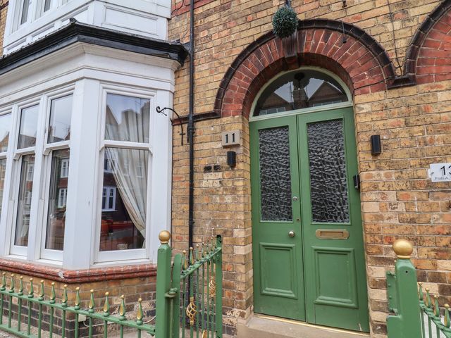 Front entrance with green door and windows at 11 Rutland Street in Filey