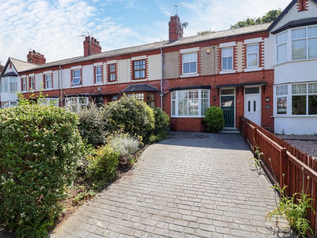 A terraced house with a front yard and pathway at 45 Brook Lane Chester