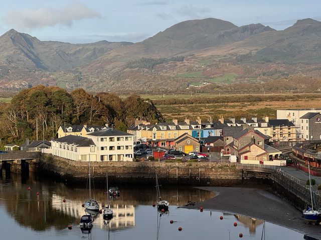 View of buildings and boats at River's Edge Penthouse in Porthmadog