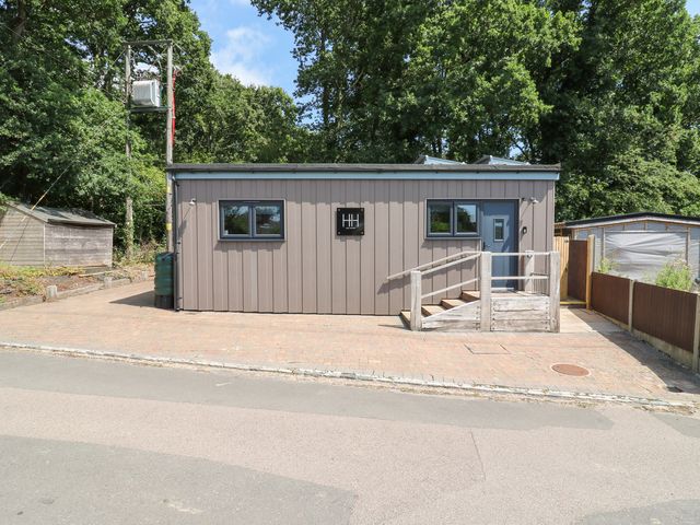 A building with steps and windows at Hub House Three Oaks near Hastings