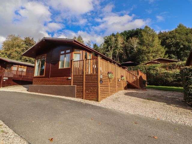 A lodge with decking and steps at Swifts Reach Lodge Kirkstone 10, Limefitt Park near Windermere