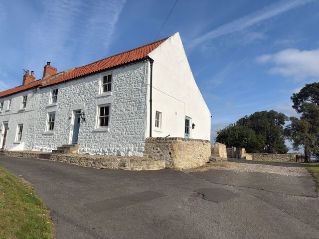 A house with steps and a pathway at Peace Cottage in Langton near Gainford