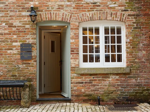 An entrance with a door and window at The Dovecote in Matlock
