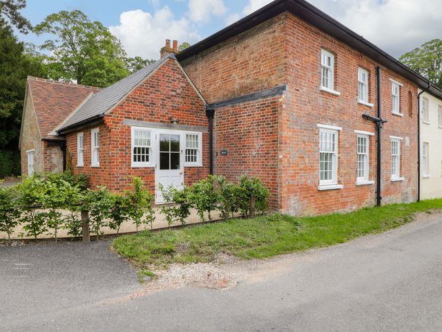 A brick house with windows and a door at Hazel in Elcot near Kintbury