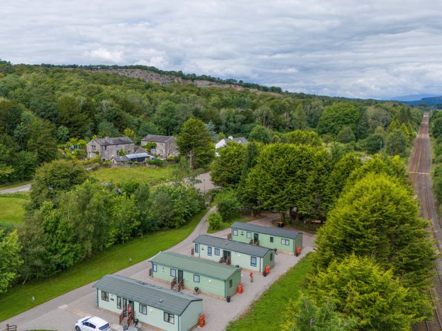 An aerial view of cabins and greenery at Lodge 1 Silverdale