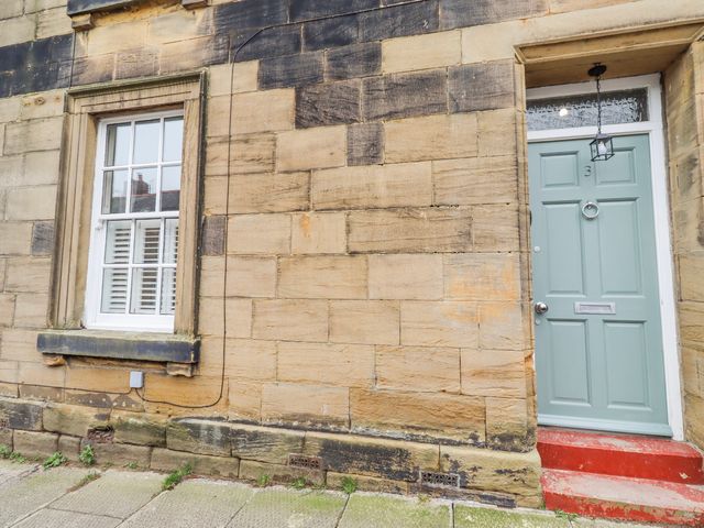 A front entrance with a door and window at 3 Lisburn Street Alnwick