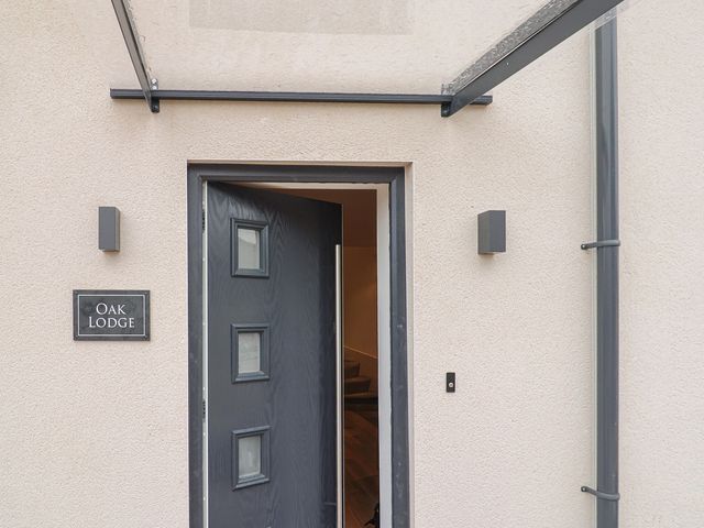 An entrance with an open door at Oak Lodge in Westonzoyland nr. Bridgwater
