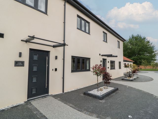 A building exterior with entrance and windows at Oak Lodge Westonzoyland nr. Bridgwater