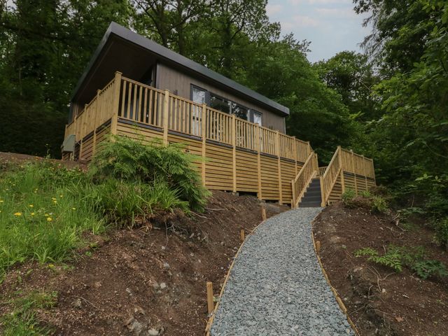 A building with decking and a pathway at Hodge Luxury Pod in Keswick