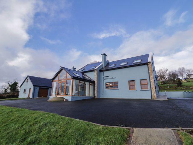 A house with a garage and garden at Ard Na Mara in Drung near Quigley's Point, County Donegal