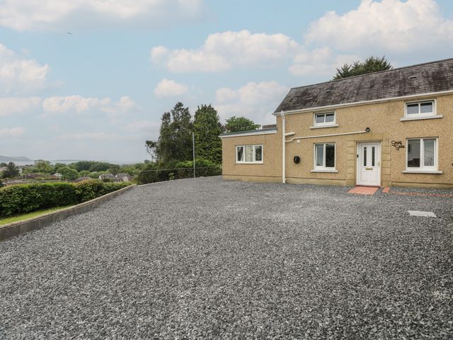 A house with a gravel driveway at Graig Goch in Burry Port