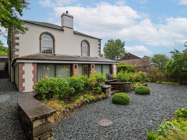 A house with garden and pathway at The School in Mungrisdale near Caldbeck