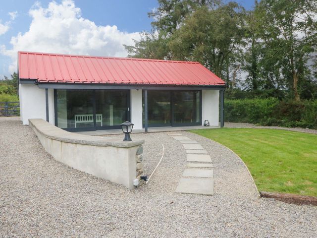 A house with a red roof and large windows at The Stall near Kealkill, County Cork
