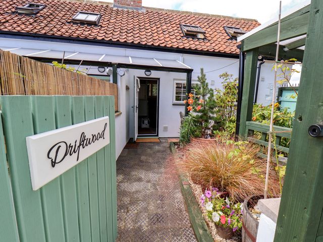 An exterior entrance with a pathway and garden at Driftwood in Flamborough