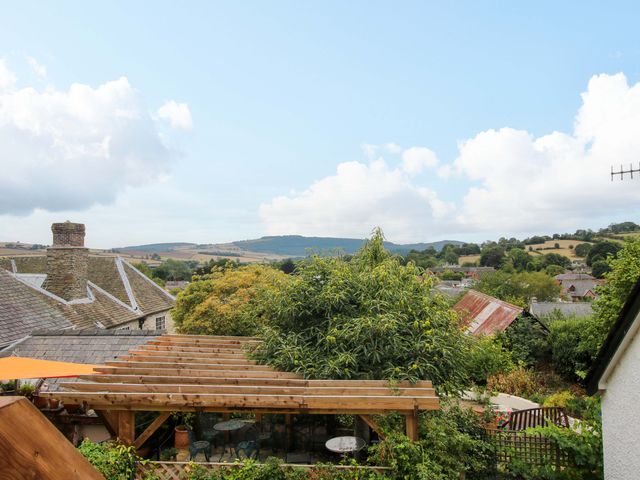 A view of houses and a garden with trees at 41 High Street in Bishop's Castle