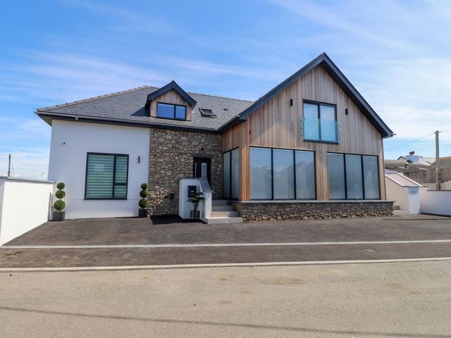 A modern house with large windows at Ardwyn Rhosneigr