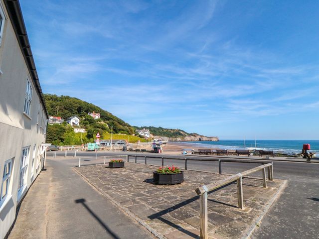 A beach with benches and planters at Iveridge in Sandsend