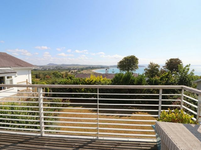 An outdoor area with a coastal view at Machroes Cottage near Bwlchtocyn near Abersoch