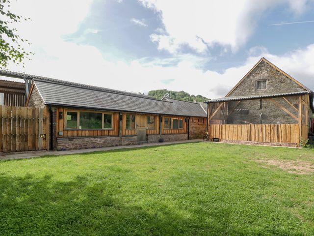 An outdoor area with buildings and grass at Monnow Pandy near Longtown (hereford)