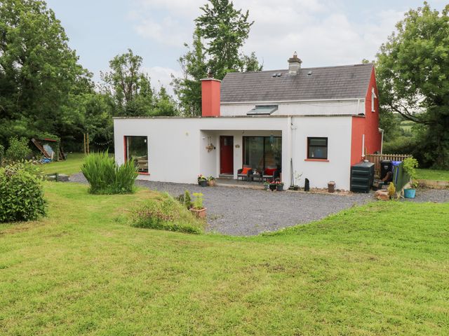 A house with a driveway and garden at Huath in Carrick on Shannon